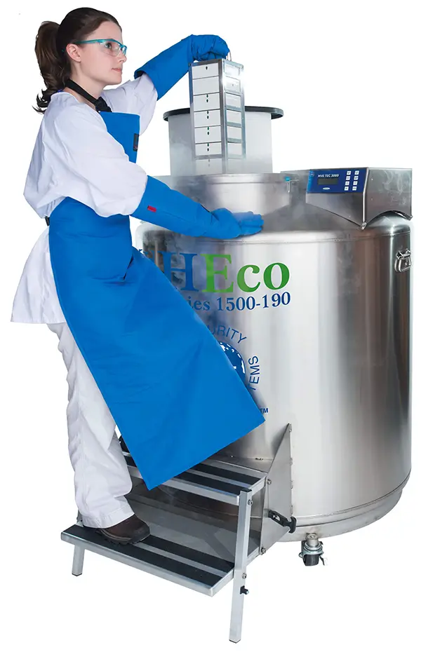 Woman Lab Worker Using an MVE HEco Series 1500-190 Freezer Unit